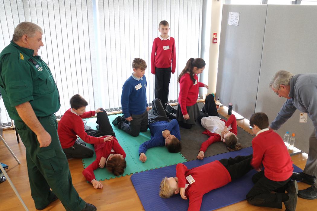 Learning about the 'recovery position' in the 1st Aid scenario.