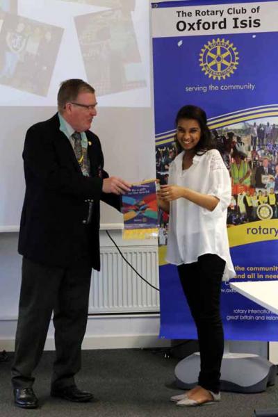 District Governor Fred King welcomes Oxford Academy Interact President Lugain Altohamy