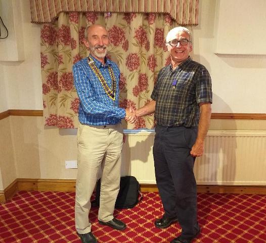 President Hywel receiving his Chain Of Office from Past President Kevin