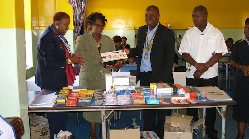 The goods being handed over to the school in the presence of Rotary District 9210 Governor Stella Dongo (extreme left)