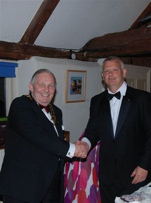 Outgoing President handing over to new President