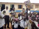 Happy smiles as the books from Bicester Rotary Club arrive