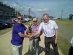 President David congratulates winning team captain Graham Ward with Boules 'Ace' Fred Bentley in the background 