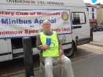 Gwyn Beavan shaking a tin for the Minibus appeal