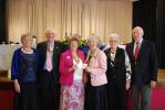 District Chairman Addriene Fox receiving a cheque from President Judi Baxter.