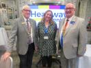 Hayley Cook, Operations Manager of Headway Kent with District Governor Ray Seager and President of the Rotary Club of South Foreland, John Dunkley.