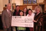 Annie and some of her Sunbeams receive a cheque.