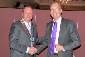 Past President Richard hands over to Chris Holmes. 