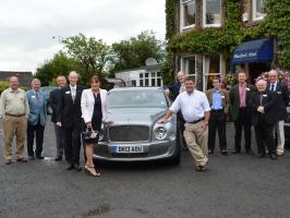 Ian Kendall (front right) and his partner, Mandy Thompson (front left) with the Bentley Mulsanne (and a few envious members and visitors.