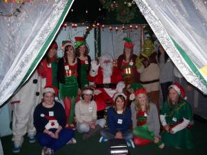 Santa and his elves in Santa's Grotto