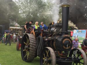 Tracey Phillips (wife of Rotary President Martin Phillips) drives one of the steamers