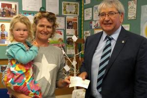 Presentation of cheque to Susan Lewis to sponsor participants' medals for their Fun Run at Kinnerley on Sunday 4th June
