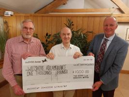 Cheque presentation to Wiltshire Air Ambulance from Rotary Club of Bradford on Avon. L-R Club President Ray Winrow, Russell Pointer-Brown (WAA) and Rotarian Steve Adams
