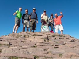 The six triumphant walkers on the summit of Pen Y Fan