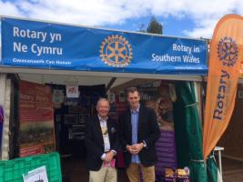 President Patrick Foy and local MP David Davies in front of the Rotary tent at the National Eisteddfod in Abergavenny