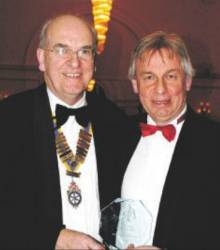 Rotary Club President Brian Roussel pictured with Award winner Rob Jenkins