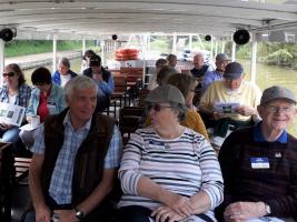 Visitors and hosts enjoy a canal trip on Vagabond