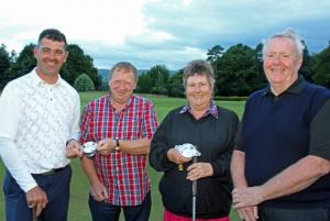 Picture shows Rotary President Gordon Steele (2nd R)  with the winning Blacknest team (L to R) Mark Lockhart, Rosie Brown and Robert Haddow. Missing from this line-up is Blacknest