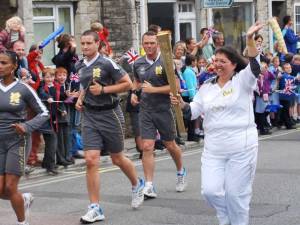 Emma willis carries the torch through Swanage