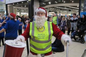 Bob in his usual Santa Claus outfit assisting in Eldon Square