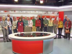 Group in The News Desk Room