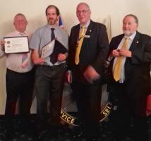 President Roger Sharp with Chris Day on his right and Mark Tarsey and Graham Bourne on his left respectively.