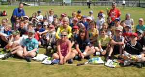 Judy Murray is surrounded by the competitors at Dunblane Sports Club.