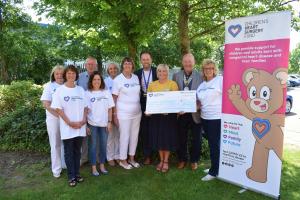 Cheque presentation with some of the people who worked so hard to raise the money:- L to R – Judith Evans, Jill Brookling, Neil Dodgson, Charlotte Woods, Rosemary Pugh, Elaine Dodgson, Andy McNally, Lisa Williams, Dick Wood, Maggie Ablitt