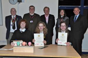 The winning team with our Rotary Club president, the three judges and the Master of Ceremonies. 