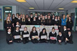 Pupils at the Royal Wootton Bassett Academy bring their filled Shoeboxes for disadvantaged children abroad.