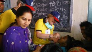 Saltburn member Anne Sadler immunising children in New Delhi, India