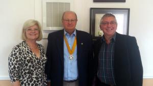 President Elect Graham Scott welcomes newly-inducted members: Rtn Dr Peter Williams and his wife Rtn Fay Williams