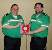 Colin and Andrew with the defibrillator