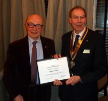 Dilwyn being presented with his 30 year certificate by President John Benbow