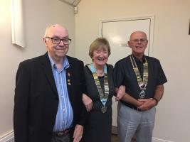 PDG Dave, District 1100 Governor Joan and Club President Phil