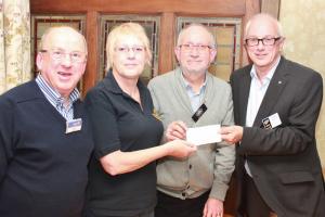 The Swindon North team are presented with the 3rd prize - a cheque for £100 by the District 1100 Governor Elect, Alan Hudson