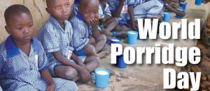 Children receiving their porridge meal.