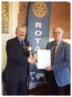 Phil Jones prersenting Rev Tim Hall with the Rotary Service Award