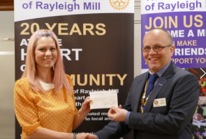 Rotary Club of Rayleigh Mill President Carl Watson presents Hannah with a cheque for £500 to add to the sum donated by many other of Hannah’s sponsors