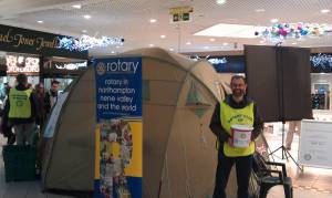 Simon Watson with the ShelterBox tent in the Grosvenor Centre