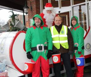 Santa, his elves and Rotary helpers.