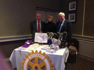 Irene McKay with her props and materials with President Elect Dave Stewart and John Brown