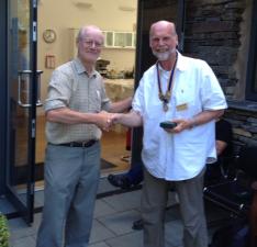 Outgoing President Andy Gilchrist 2014-15 handing over title and jewel to incoming President Colin Thomson 2015-16