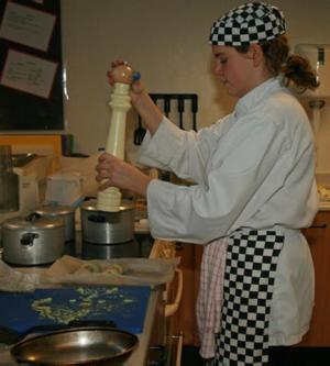 Winner Roseanna McMahon  Comberton Village College preparing one of her dishes.