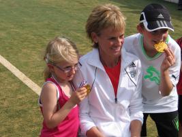 Judy Murray with winner of Mini Cup, Rosie Woodward and winner of Junior Cup, Fraser Sheriff.