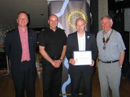 Speakers Host George Morrison, Chief Superintendent Davie Flynn, Tony Ford with his Paul Harris Fellowship Award Certificate and President Iain Smith