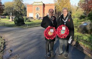David Clayfield, President of Arbury Rotary Club and Ann Williams President of Arbury Inner Wheel Club present our Tributes at the Service in Riversley Park