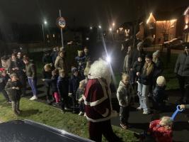 Father Christmas meets the children in Vulcan Village