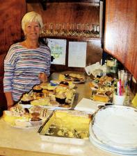 President of Seaburn Inner Wheel Judith Telfer with a tasty selection of cakes.
