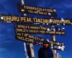 Standing at the Summit of Mount Kilimanjaro